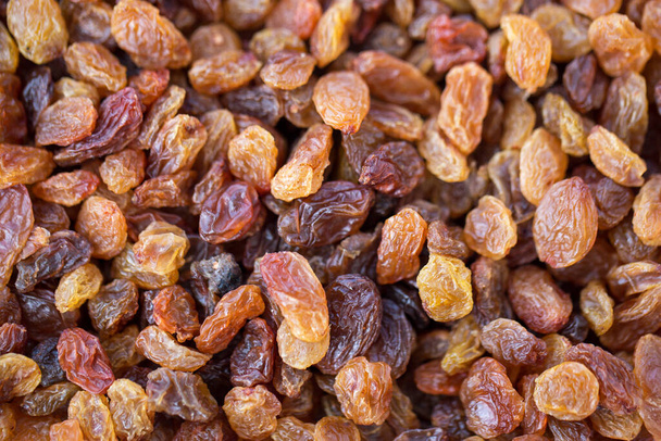 seedless raisins texture. top view - Fotografie, Obrázek