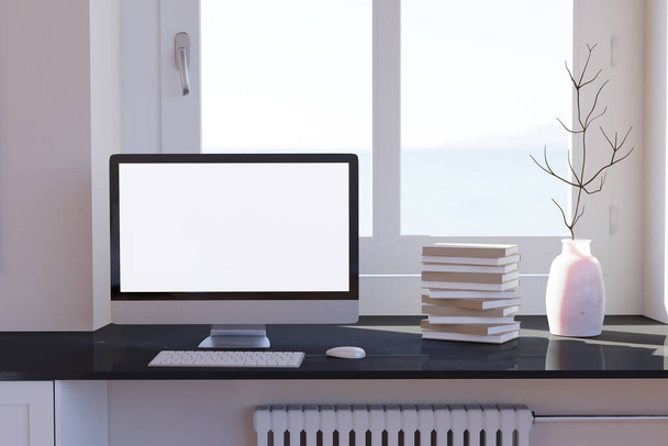 Κενή επιφάνεια εργασίας υπολογιστή με πληκτρολόγιο στο παράθυρο, βιβλία σε μαρμάρινο τραπέζι στο ηλιόλουστο δωμάτιο, mockup - Φωτογραφία, εικόνα