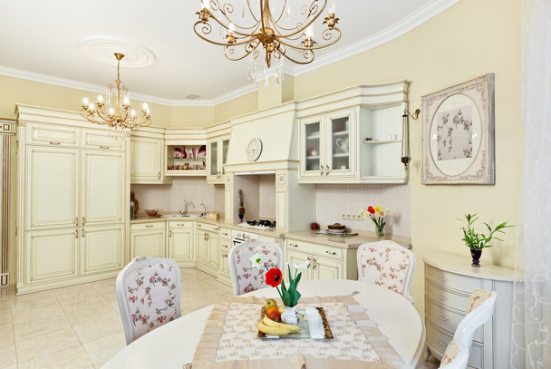 Classic style kitchen and dining room interior in beige pastoral - Foto, imagen