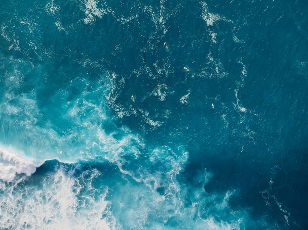 Blue ocean with waves and foam. Aerial view, sea background - Foto, afbeelding