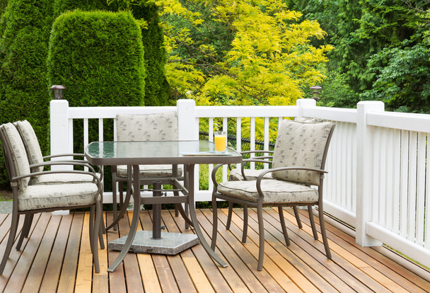 Outdoor Furniture on Cedar Wood Patio during nice day  - Photo, Image