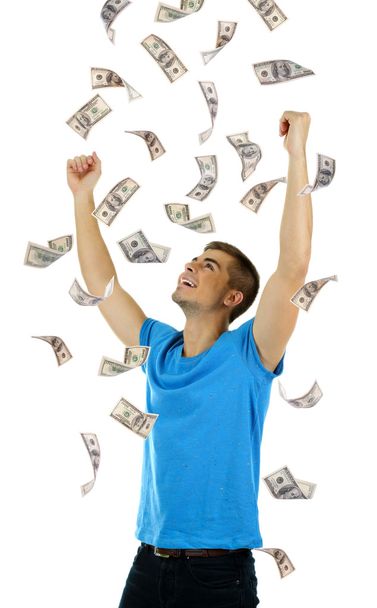 Щасливий чоловік насолоджується дощем грошей, ізольований на білому
 - Фото, зображення