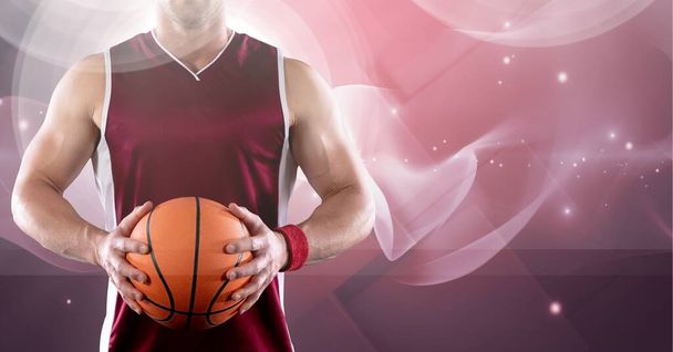 Composition of midsection of basketball player holding ball with copy space. sport and competition concept digitally generated image. - Foto, Imagem