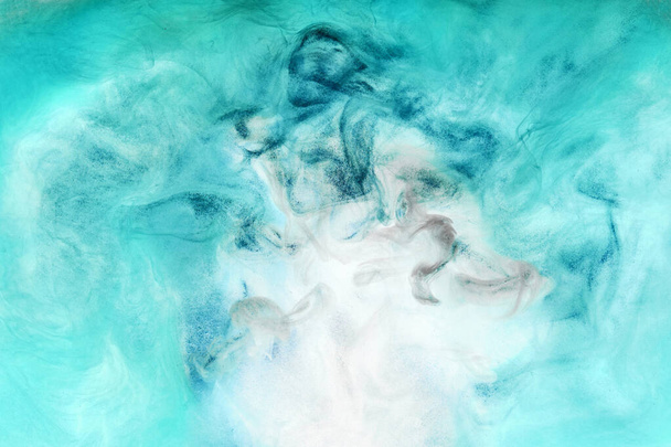 Abstract blue ocean, paint in water background. swirl of splashes and waves in motion. Fluid art wallpaper, liquid vibrant colors - Photo, image
