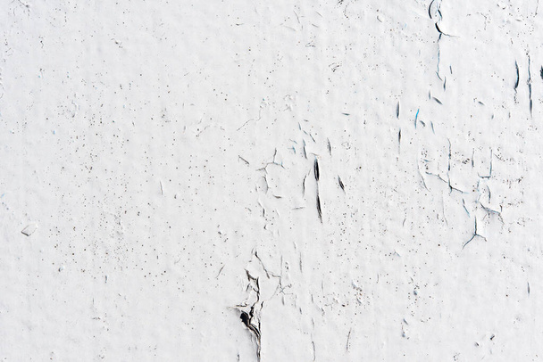 pared blanca con pintura agrietada
 - Foto, Imagen