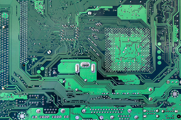 Green computer motherboard close up. Top view, flat lay. Background - Photo, Image