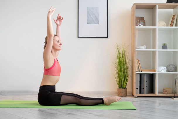 home training athletic woman fitness stretching - Valokuva, kuva