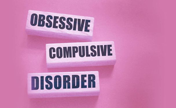 Obsessive Compulsive Disorder words on wooden blocks. Psychiatry psychological problem concept, OCD. - Photo, Image