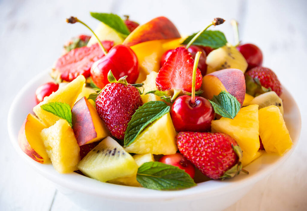 Fresh summer fruit salad with strawberries and cherries - Photo, Image