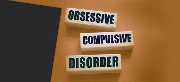 Obsessive Compulsive Disorder words on wooden blocks. Psychiatry psychological problem concept, OCD. - Photo, Image