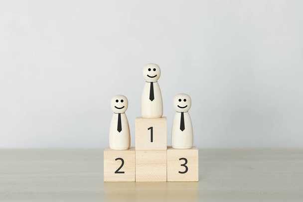 Wooden people human woman standing on podium wood blocks. Business competition ranking. people corporate successful. - Photo, Image
