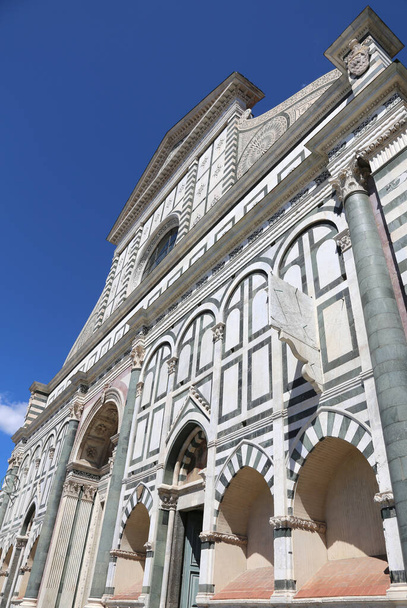 ancient church of Santa Maria Novella in Florence and a small sundial on the facade - Foto, Imagen