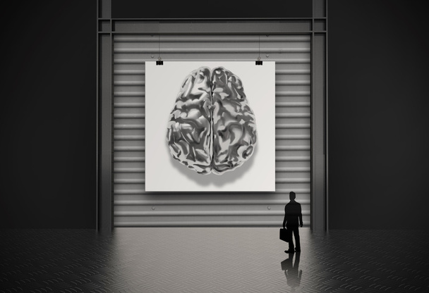 бизнесмен рассматривает 3D-металлический мозг на пушке как концепцию
  - Фото, изображение