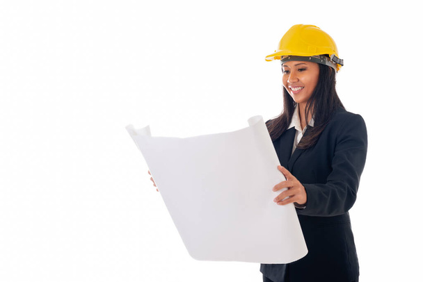 portrait of asian engineer woman with helmet holding blueprints isolated white background with copy space - Photo, Image