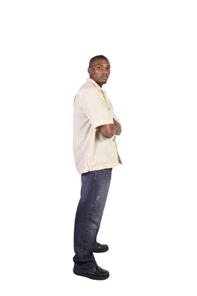 Casual Black Man with his Arms Crossed Posing - Isolated Background - Photo, image