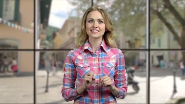 Beautiful smiling girl touching virtual screen. - Video, Çekim
