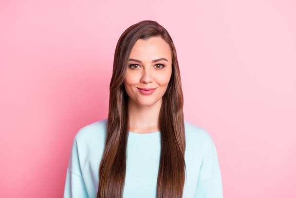 Photo of pretty joyful young woman wear blue pullover good mood smile isolated on pastel pink color background - Zdjęcie, obraz