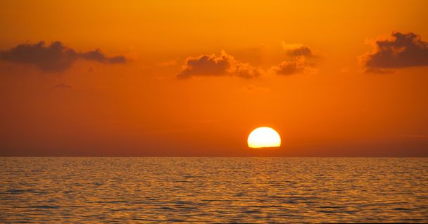 Fabulous sunset on a background of sky and sea. - Φωτογραφία, εικόνα