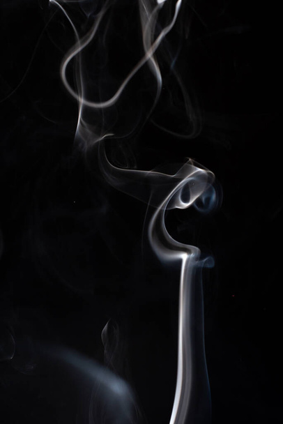 cloud of white smoke on black background - Valokuva, kuva