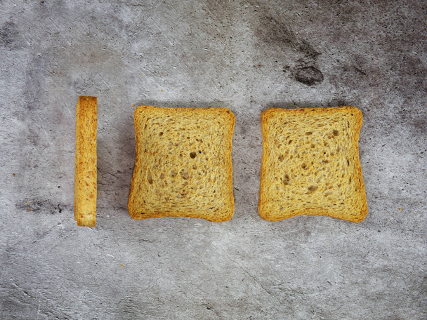 minimal conceptual photo of the hundred number obtained with three rusks - Φωτογραφία, εικόνα