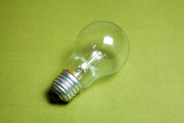 light bulb on a green background. concept ideas - Photo, Image