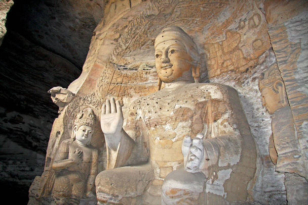 Estatua de Buda de la grottoe de Yungang, Shanxi China. Famoso sitio del patrimonio mundial en China. Enfoque selectivo - Foto, imagen