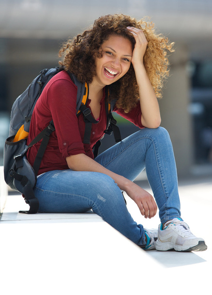 Female college student smiling outdoors - Fotografie, Obrázek