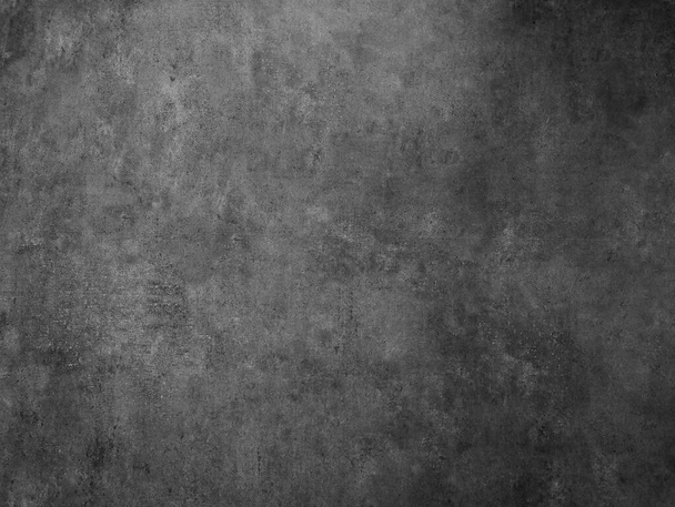 Zwart-wit achtergrond afbeelding, ruw oppervlak, lijkt op een cementvloer. - Foto, afbeelding