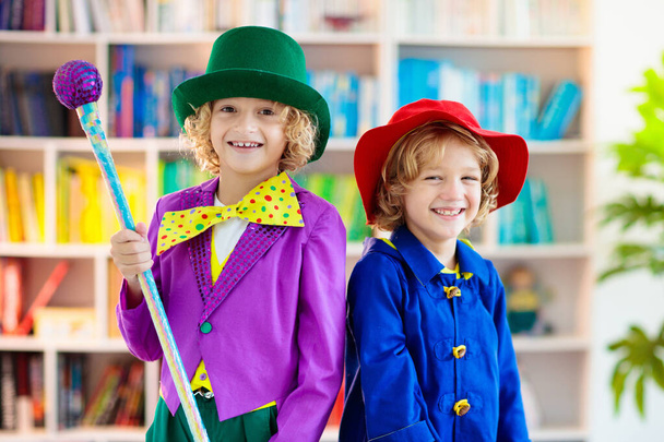 Kids in book character costume. School dress up party. English language and literature study for young children. Reading for primary school kid. Library event. Fun learning. - Photo, Image