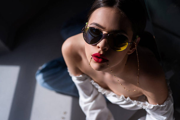 Stylish fashion woman in sunglasses, trendy fashionable accessories. - Фото, зображення