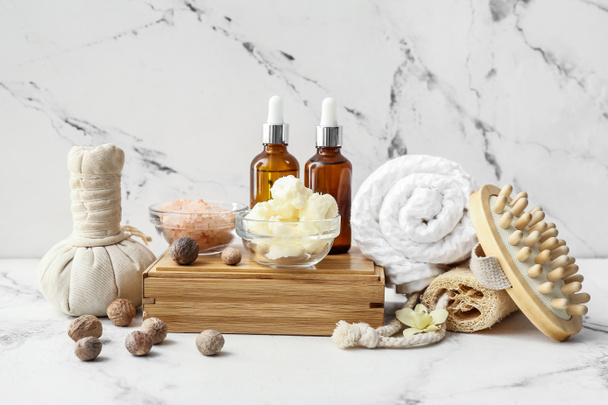Spa set with shea butter on light background - Photo, Image
