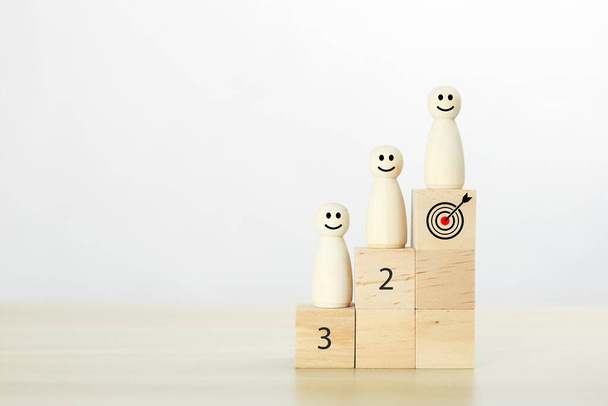 Wooden people human woman standing on podium wood blocks. Business competition ranking. people corporate successful. - Photo, Image