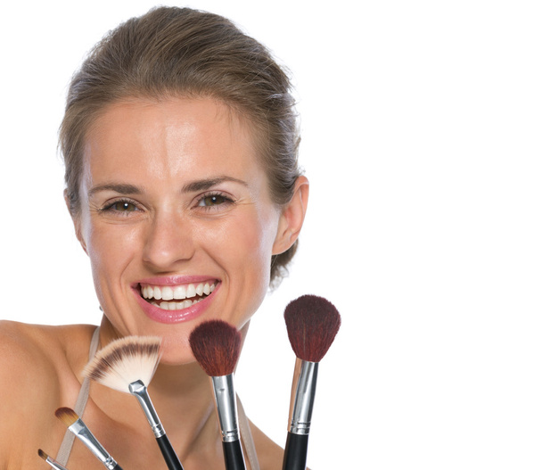 Woman with makeup brushes - Fotoğraf, Görsel