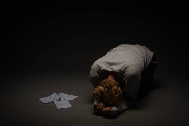Depressed boy is suffering from the inside about the letters he received - Foto, Imagen