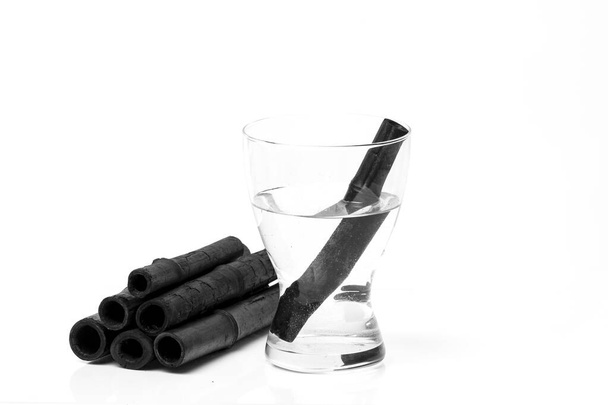 Bamboo charcoal water filter sticks. Natural bamboo charcoal is a powerful purifier which refreshes tap water - Photo, Image