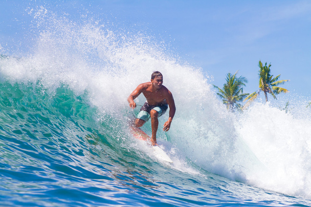 Surfing a Wave. Bali Island. Indonesia. - Фото, изображение