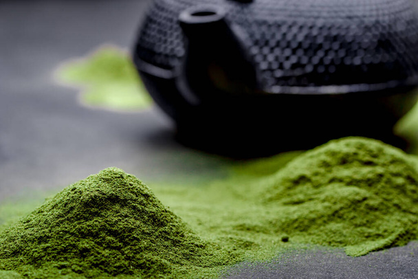 Matcha green tea on black background - Photo, Image