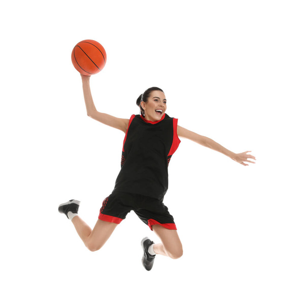 Professional sportswoman playing basketball on white background - Fotoğraf, Görsel