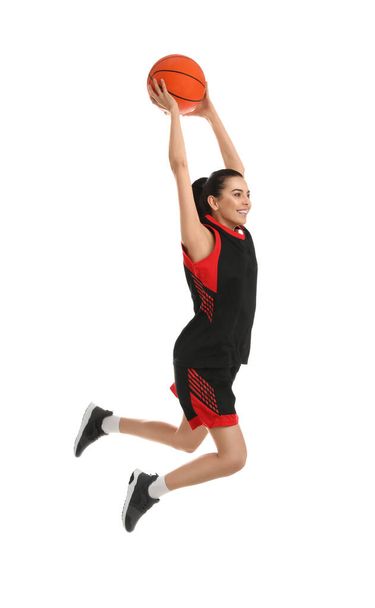 Professional sportswoman playing basketball on white background - Zdjęcie, obraz