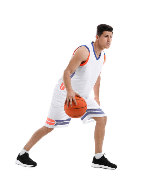 Professional sportsman playing basketball on white background - Valokuva, kuva