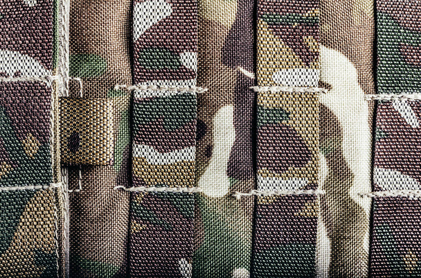 Detailní fotografie vojenského maskovaného obrněného vestového molárního systému. - Fotografie, Obrázek