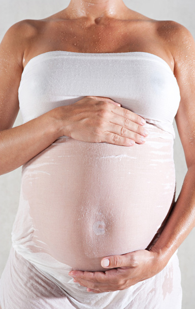 zwangere vrouw lichaam - Foto, afbeelding