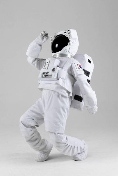 dancing astronaut, white background - Fotoğraf, Görsel