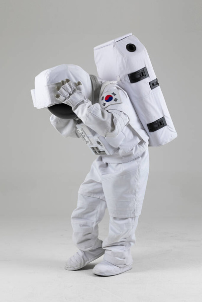 depressed astronaut, white background - Fotoğraf, Görsel