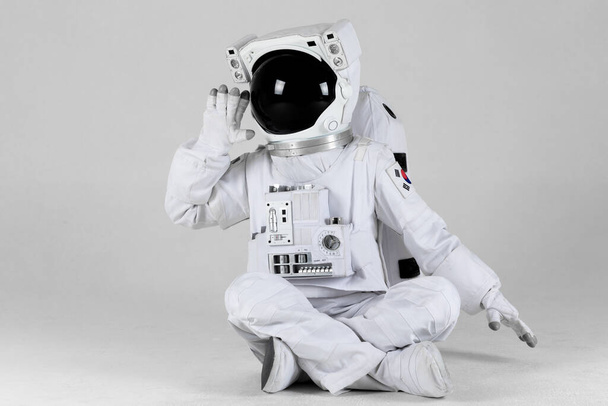 shouting astronaut, white background - Fotó, kép