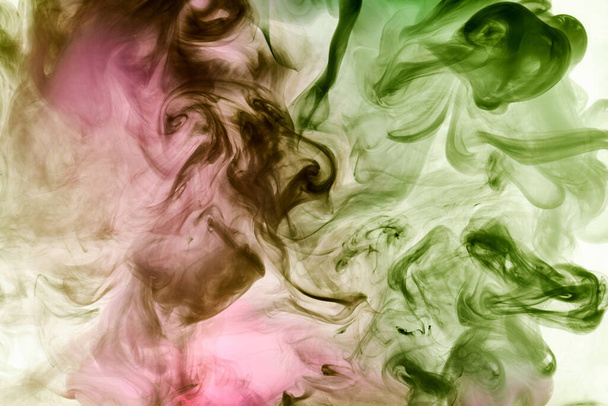 Vibrant colors, abstract bright smoke background. Splash of paint in water, colorful cloud in motion. Concept hookah, perfume backdrop, dance wallpaper - Valokuva, kuva