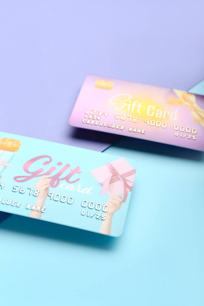 Gift cards on color background, closeup - Photo, Image
