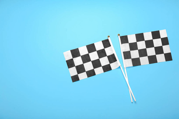 Racing flags on color background - Photo, Image