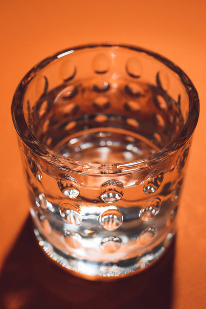 Glass of water on color background, closeup - Photo, image
