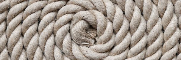 Navy rope folded in circle top view - 写真・画像